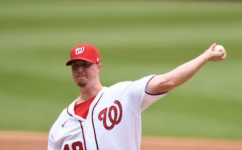 Sam Clay #49 of the Washington Nationals pitches during the completion of a suspended baseball game against the San Diego Padres at Nationals Park on July 18, 2021 in Washington, DC. The game was suspended after a shooting outside the stadium. (Photo by Mitchell Layton/Getty Images)