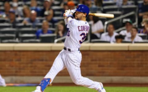 NEW YORK, NY – SEPTEMBER 12: Michael Conforto #30 of the New York Mets in action against the New York Yankees during a game at Citi Field on September 12, 2021 in New York City. (Photo by Rich Schultz/Getty Images)