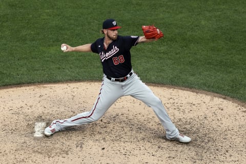 NEW YORK, NY – AUGUST 11: Gabe Klobosits #68 of the Washington Nationals pitches during the seventh inning against the New York Mets at Citi Field on August 11, 2021 in New York City. This is a continuation of August 10 game which was suspended due to inclement weather. (Photo by Adam Hunger/Getty Images)