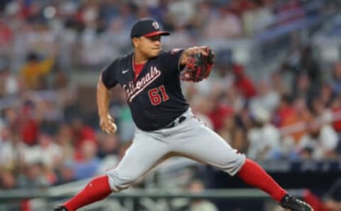 ATLANTA, GEORGIA – SEPTEMBER 20: Erasmo Ramirez #61 of the Washington Nationals pitches in the third inning against the Atlanta Braves at Truist Park on September 20, 2022 in Atlanta, Georgia. (Photo by Kevin C. Cox/Getty Images)