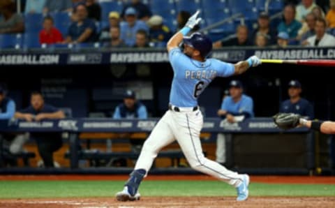 ST PETERSBURG, FLORIDA – AUGUST 24: David Peralta #6 of the Tampa Bay Rays hits during a game against the Los Angeles Angels at Tropicana Field on August 24, 2022 in St Petersburg, Florida. (Photo by Mike Ehrmann/Getty Images)