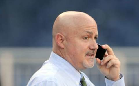 WASHINGTON, DC – SEPTEMBER 23: General Manager Mike Rizzo of the Washington Nationals talks on the phone before the game against the New York Mets at Nationals Park on September 23, 2014 in Washington, DC. (Photo by G Fiume/Getty Images)