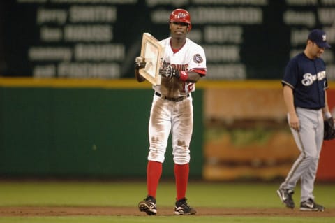 WASHINGTON – SEPTEMBER 16: Alfonso Soriano #12 of the Washington Nationals, steals his 40th base to become only the fourth player in baseball to hit 40 home runs and steal 40 bases in a season in a game against the Milwaukee Brewers on September 16, 2006 at RFK Stadium in Washington D.C. The Nationals won 8-5. (Photo by Mitchell Layton/Getty Images)