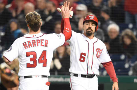 WASHINGTON, DC – APRIL 09: Bryce Harper #34 and Anthony Rendon #6 celebrate scoring on a Howie Kendrick #12 double in the first inning of the Washington Nationals during a baseball game against the Atlanta Braves at Nationals Park on April 9, 2018. (Photo by Mitchell Layton/Getty Images)