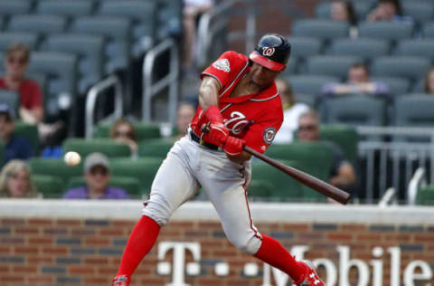 JUNE 02 – ATLANTA, GA: Second baseman Wilmer Difo #1 of the Washington Nationals hits an RBI triple in the 14th inning during the game against the Atlanta Braves. (Photo by Mike Zarrilli/Getty Images)