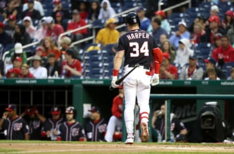 WASHINGTON, DC – JUNE 22: Bryce Harper #34 of the Washington Nationals walks back to the dugout after striking out in the first inning against the Philadelphia Phillies, on June 22nd in Washington. (Photo by Rob Carr/Getty Images)