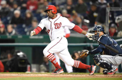 APRIL 09 – WASHINGTON, DC: Howie Kendrick #12 of the Washington Nationals doubles in two runs in the first inning during a baseball game vs the Atlanta Braves at Nats Park. (Photo Mitchell Layton of Getty Images)