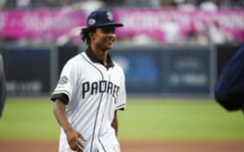 SAN DIEGO, CA – JUNE 8: San Diego Padres C.J. Abrams throws out the first pitch before a baseball game between the San Diego Padres and the Washington Nationals at Petco Park June 8, 2019 in San Diego, California. (Photo by Denis Poroy/Getty Images)