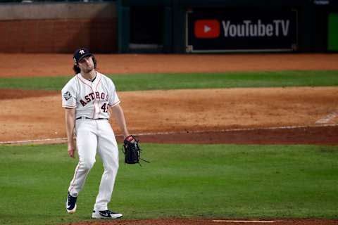 HOUSTON, TEXAS – OCTOBER 22: Gerrit  Cole #45 of the Houston Astros reacts after allowing a two-RBI double to Juan Soto (not pictured) of the Washington Nationals during the fifth inning in Game One of the 2019 World Series at Minute Maid Park on October 22, 2019 in Houston, Texas. (Photo by Tim Warner/Getty Images)