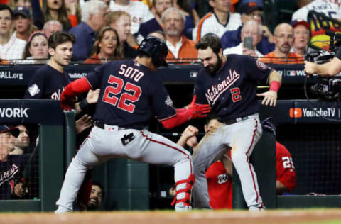 HOUSTON, TEXAS – OCTOBER 29: Juan Soto #22 of the Washington Nationals is congratulated by his teammate Adam Eaton #2 after hitting a solo home run against the Houston Astros during the fifth inning in Game Six of the 2019 World Series at Minute Maid Park on October 29, 2019 in Houston, Texas. (Photo by Elsa/Getty Images)