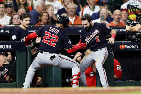 HOUSTON, TEXAS – OCTOBER 29: Juan  Soto #22 of the Washington Nationals is congratulated by his teammate Adam  Eaton #2 after hitting a solo home run against the Houston Astros during the fifth inning in Game Six of the 2019 World Series at Minute Maid Park on October 29, 2019 in Houston, Texas. (Photo by Elsa/Getty Images)