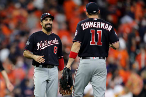 HOUSTON, TEXAS – OCTOBER 29: Anthony  Rendon #6 and Ryan  Zimmerman #11 of the Washington Nationals celebrate their teams 7-2 win against the Houston Astros in Game Six of the 2019 World Series at Minute Maid Park on October 29, 2019 in Houston, Texas. (Photo by Elsa/Getty Images)