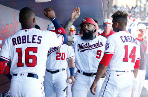 WEST PALM BEACH, FLORIDA – MARCH 12: Eric Thames #9 of the Washington Nationals celebrates with teammates after scoring a run against the New York Yankees during a Grapefruit League spring training game at FITTEAM Ballpark of The Palm Beaches on March 12, 2020 in West Palm Beach, Florida. (Photo by Michael Reaves/Getty Images)