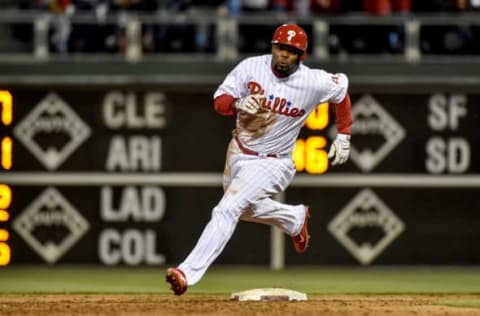 Apr 8, 2017; Philadelphia, PA, USA; Philadelphia Phillies left fielder Howie Kendrick (47) rounds second base after hitting a triple during the first inning of game against the Washington Nationals at Citizens Bank Park. Mandatory Credit: John Geliebter-USA TODAY Sports