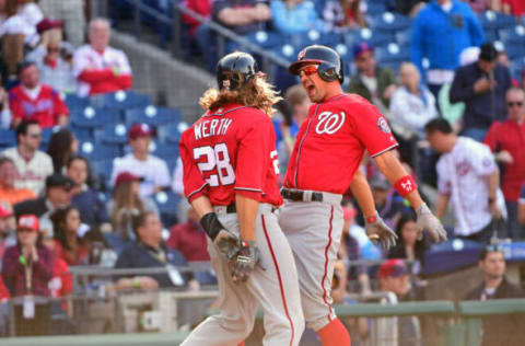 Apr 9, 2017; Philadelphia, PA, USA; Washington Nationals first baseman Ryan Zimmerman (11) celebrates his game-tying, pinch-hit three run home run with left fielder Jayson Werth (28) during the ninth inning against the Philadelphia Phillies at Citizens Bank Park. The Phillies defeated the Nationals, 4-3. Mandatory Credit: Eric Hartline-USA TODAY Sports