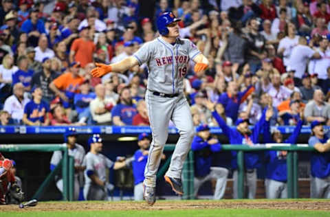 Apr 10, 2017; Philadelphia, PA, USA; New York Mets right fielder Jay Bruce (19) watches his two run home run during the eighth inning against the Philadelphia Phillies at Citizens Bank Park. The Mets defeated the Phillies 4-3. Mandatory Credit: Eric Hartline-USA TODAY Sports