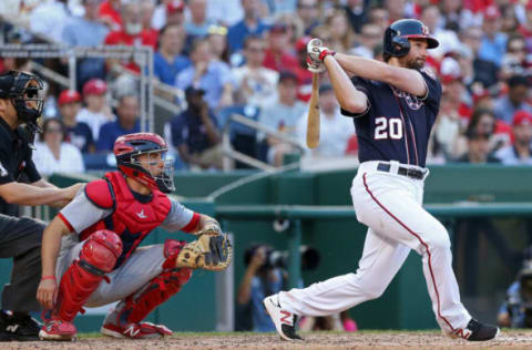 Apr 12, 2017; Washington, DC, USA; Washington Nationals second baseman Daniel Murphy (20) hits a single against the St. Louis Cardinals in the seventh inning at Nationals Park. The Cardinals won 6-1. Mandatory Credit: Geoff Burke-USA TODAY Sports