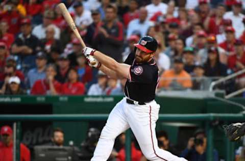 Apr 14, 2017; Washington, DC, USA; Washington Nationals second baseman Daniel Murphy (20) hits a walk off RBI double against the Philadelphia Phillies during the tenth inning at Nationals Park. Mandatory Credit: Brad Mills-USA TODAY Sports