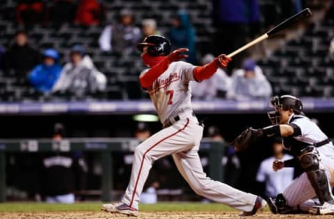 Apr 25, 2017; Denver, CO, USA; Washington Nationals shortstop Trea Turner (7) hits a 3 RBI triple in the seventh inning against the Colorado Rockies at Coors Field. Mandatory Credit: Isaiah J. Downing-USA TODAY Sports