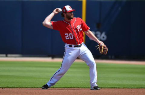 Mar 5, 2017; West Palm Beach, FL, USA; Washington Nationals second baseman Daniel Murphy (20) throws the ball to first base for an out against the Minnesota Twins at The Ballpark of the Palm Beaches. Mandatory Credit: Jasen Vinlove-USA TODAY Sports