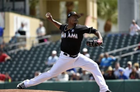 Mar 6, 2017; Jupiter, FL, USA; Miami Marlins starting pitcher Edinson Volquez (36) delivers a pitch against the New York Mets during a spring training game at Roger Dean Stadium. Mandatory Credit: Steve Mitchell-USA TODAY Sports