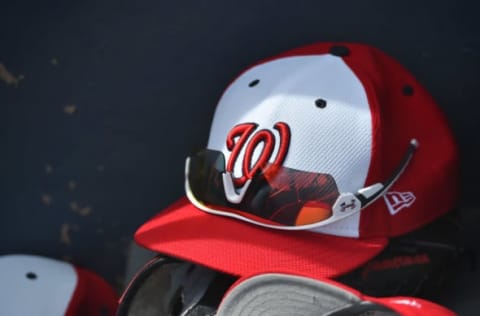 Mar 13, 2017; West Palm Beach, FL, USA; A view of a Washington Nationals hat and sunglasses in the dugout during a spring training game between the Washington Nationals and the Detroit Tigers at The Ballpark of the Palm Beaches. Mandatory Credit: Jasen Vinlove-USA TODAY Sports