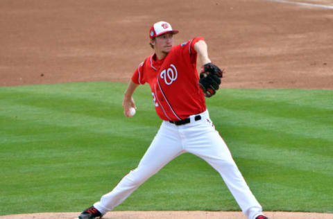 Mar 23, 2017; West Palm Beach, FL, USA; Washington Nationals starting pitcher Erick Fedde (62) delivers a pitch against the New York Mets during a spring training game at The Ballpark of the Palm Beaches. Mandatory Credit: Steve Mitchell-USA TODAY Sports