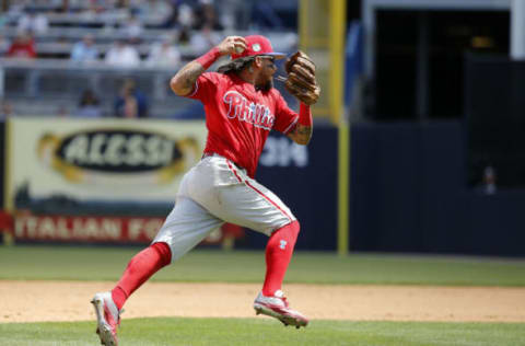 Mar 24, 2017; Tampa, FL, USA; Philadelphia Phillies shortstop Freddy Galvis (13) throws the ball to first base for an out during the fourth inning against the New York Yankees at George M. Steinbrenner Field. Mandatory Credit: Kim Klement-USA TODAY Sports