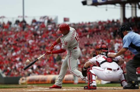 Apr 3, 2017; Cincinnati, OH, USA; Philadelphia Phillies second baseman Cesar Hernandez (16) hits a home run during the first inning against the Cincinnati Reds at Great American Ball Park. Mandatory Credit: Frank Victores-USA TODAY Sports