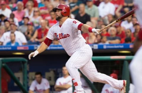 Aug 20, 2016; Philadelphia, PA, USA; Philadelphia Phillies catcher Cameron Rupp (29) hits an RBI single against the St. Louis Cardinals during the first inning at Citizens Bank Park. Mandatory Credit: Bill Streicher-USA TODAY Sports