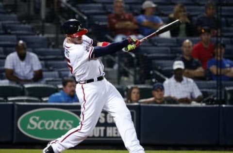 Sep 27, 2016; Atlanta, GA, USA; Atlanta Braves catcher Tyler Flowers (25) hits a three-run home run in the sixth inning against the Philadelphia Phillies at Turner Field. Mandatory Credit: Jason Getz-USA TODAY Sports