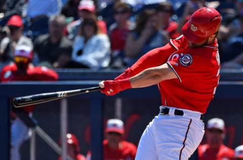 Mar 16, 2017; West Palm Beach, FL, USA; Washington Nationals right fielder Bryce Harper (34) connects for a solo home run against the New York Mets during a spring training game at The Ballpark of the Palm Beaches. Mandatory Credit: Jasen Vinlove-USA TODAY Sports