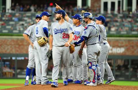 ATLANTA, GA – JULY 27: Manager Dave Roberts #30 of the Los Angeles Dodgers calls to the bullpen after removing Clayton Kershaw #22 from the game in the eighth inning against the Atlanta Braves at SunTrust Park on July 27, 2018 in Atlanta, Georgia. (Photo by Scott Cunningham/Getty Images)