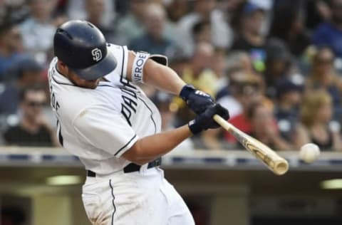 SAN DIEGO, CA – AUGUST 11: Hunter Renfroe #10 of the San Diego Padres hits a double during the third inning of a baseball game against the Philadelphia Phillies at PETCO Park on August 11, 2018 in San Diego, California. (Photo by Denis Poroy/Getty Images)