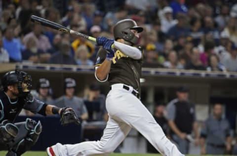 SAN DIEGO, CA – AUGUST 17: Eric Hosmer #30 of the San Diego Padres hits an RBI single during the third inning of a baseball game against the Arizona Diamondbacks at PETCO Park on August 17, 2018 in San Diego, California. (Photo by Denis Poroy/Getty Images)