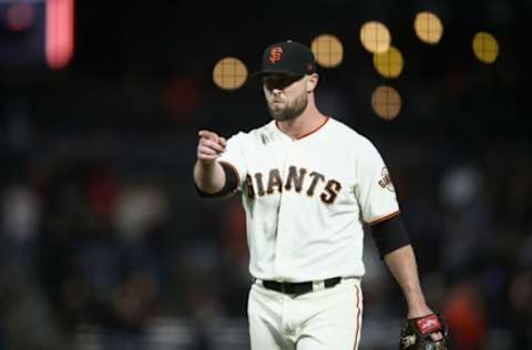 SAN FRANCISCO, CA – AUGUST 27: Hunter Strickland #60 of the San Francisco Giants points to catcher Nick Hundley #5 after they beat the Arizona Diamondbacks at AT&T Park on August 27, 2018 in San Francisco, California. (Photo by Ezra Shaw/Getty Images)