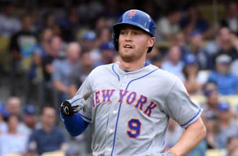 LOS ANGELES, CA – SEPTEMBER 05: Brandon Nimmo #9 of the New York Mets scores on a Wilmer Flores #4 single to take a 5-2 lead over the Los Angeles Dodgers during the fifth inning at Dodger Stadium on September 5, 2018, in Los Angeles, California. (Photo by Harry How/Getty Images)