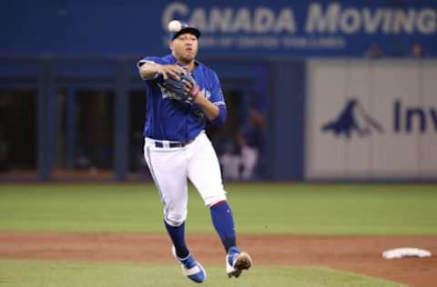 TORONTO, ON – SEPTEMBER 9: Yangervis Solarte #26 of the Toronto Blue Jays throws out the runner at first base in the first inning during MLB game action against the Cleveland Indians at Rogers Centre on September 9, 2018, in Toronto, Canada. (Photo by Tom Szczerbowski/Getty Images)