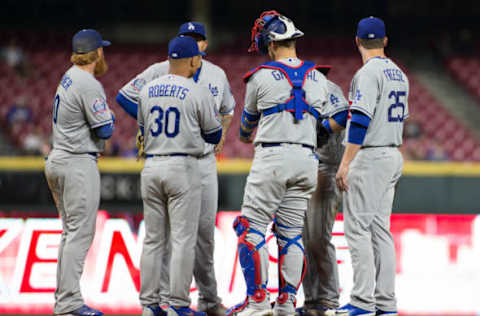 CINCINNATI, OH – SEPTEMBER 10: Manager Dave Roberts #30 of the Los Angeles Dodgers talks to his team in the fourth inning against the Cincinnati Reds at Great American Ball Park on September 10, 2018 in Cincinnati, Ohio. (Photo by Justin Casterline/Getty Images)