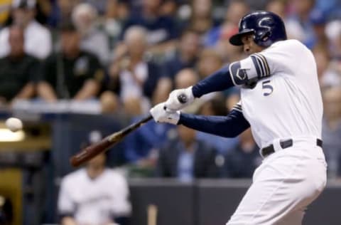 MILWAUKEE, WI – SEPTEMBER 18: Jonathan Schoop #5 of the Milwaukee Brewers hits a single in the second inning against the Cincinnati Reds at Miller Park on September 18, 2018 in Milwaukee, Wisconsin. (Photo by Dylan Buell/Getty Images)