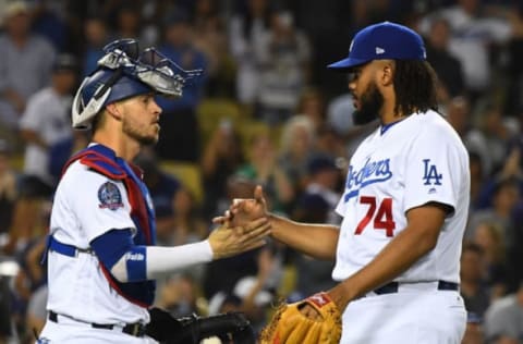 LOS ANGELES, CA – SEPTEMBER 22: Catcher Yasmani Grandal #9 and pitcher Kenley Jansen #74 of the Los Angeles Dodgers shake hands after Jansen earns his 37th save of the season to defeat the San Diego Padres at Dodger Stadium on September 22, 2018, in Los Angeles, California. (Photo by Jayne Kamin-Oncea/Getty Images)