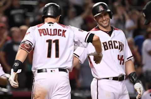 PHOENIX, AZ – SEPTEMBER 26: A.J. Pollock #11 of the Arizona Diamondbacks is congratulated by Paul Goldschmidt #44 after hitting a three-run home run during the fifth inning of the MLB game against the Los Angeles Dodgers at Chase Field on September 26, 2018, in Phoenix, Arizona. (Photo by Jennifer Stewart/Getty Images)