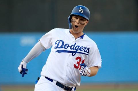 LOS ANGELES, CA – OCTOBER 04: Joc Pederson #31 of the Los Angeles Dodgers rounds the bases after hitting a home run during the first inning against the Atlanta Braves during Game One of the National League Division Series at Dodger Stadium on October 4, 2018 in Los Angeles, California. (Photo by Sean M. Haffey/Getty Images)