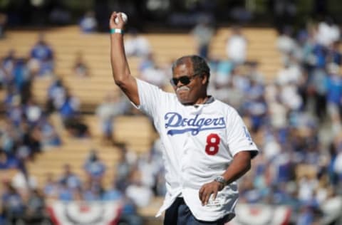 LOS ANGELES, CA – OCTOBER 17: Former Los Angeles Dodgers player Reggie Smith throws out the ceremonial first pitch for Game Five of the National League Championship Series between the Milwaukee Brewers and the Los Angeles Dodgers at Dodger Stadium on October 17, 2018 in Los Angeles, California. (Photo by Jae C. Hong-Pool/Getty Images)