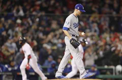 BOSTON, MA – OCTOBER 23: Alex Wood #57 of the Los Angeles Dodgers reacts as Eduardo Nunez #36 of the Boston Red Sox rounds the bases after his three-run home run during the seventh inning in Game One of the 2018 World Series at Fenway Park on October 23, 2018 in Boston, Massachusetts. (Photo by Maddie Meyer/Getty Images)