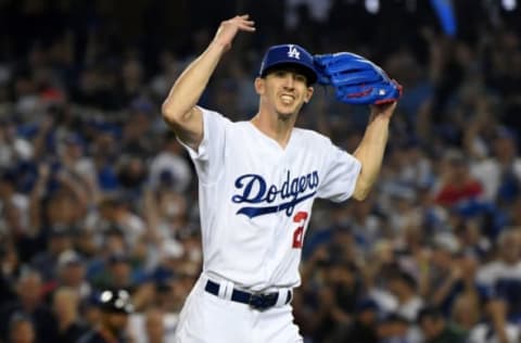 LOS ANGELES, CA – OCTOBER 26: Walker Buehler #21 of the Los Angeles Dodgers reacts after retiring the side on a strike out during the seventh inning against the Boston Red Sox in Game Three of the 2018 World Series at Dodger Stadium on October 26, 2018 in Los Angeles, California. (Photo by Harry How/Getty Images)