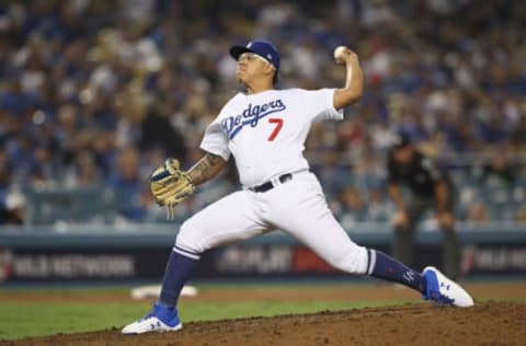 LOS ANGELES, CA – OCTOBER 26: Julio Urias #7 of the Los Angeles Dodgers delivers the pitch during the seventeenth inning against the Boston Red Sox in Game Three of the 2018 World Series at Dodger Stadium on October 26, 2018, in Los Angeles, California. (Photo by Ezra Shaw/Getty Images)