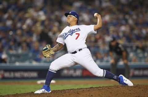 LOS ANGELES, CA – OCTOBER 26: Julio Urias #7 of the Los Angeles Dodgers delivers the pitch during the seventeenth inning against the Boston Red Sox in Game Three of the 2018 World Series at Dodger Stadium on October 26, 2018 in Los Angeles, California. (Photo by Ezra Shaw/Getty Images)