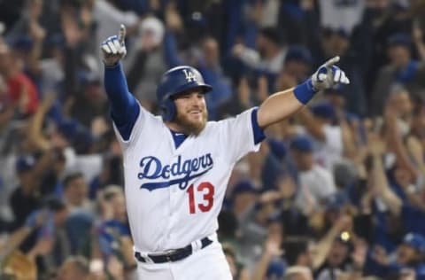 LOS ANGELES, CA – OCTOBER 26: Max Muncy #13 of the Los Angeles Dodgers celebrates his eighteenth inning walk-off home run to defeat the the Boston Red Sox 3-2 in Game Three of the 2018 World Series at Dodger Stadium on October 26, 2018 in Los Angeles, California. (Photo by Harry How/Getty Images)