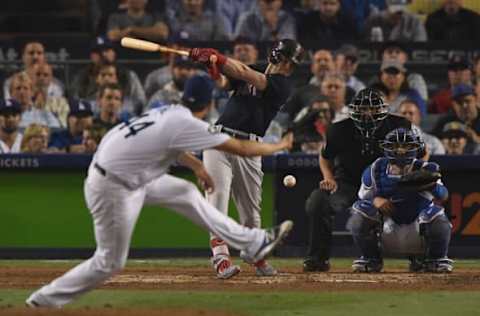 LOS ANGELES, CA – OCTOBER 27: Andrew Benintendi #16 of the Boston Red Sox hits the ball against Rich Hill #44 of the Los Angeles Dodgers in Game Four of the 2018 World Series at Dodger Stadium on October 27, 2018 in Los Angeles, California. (Photo by Kevork Djansezian/Getty Images)